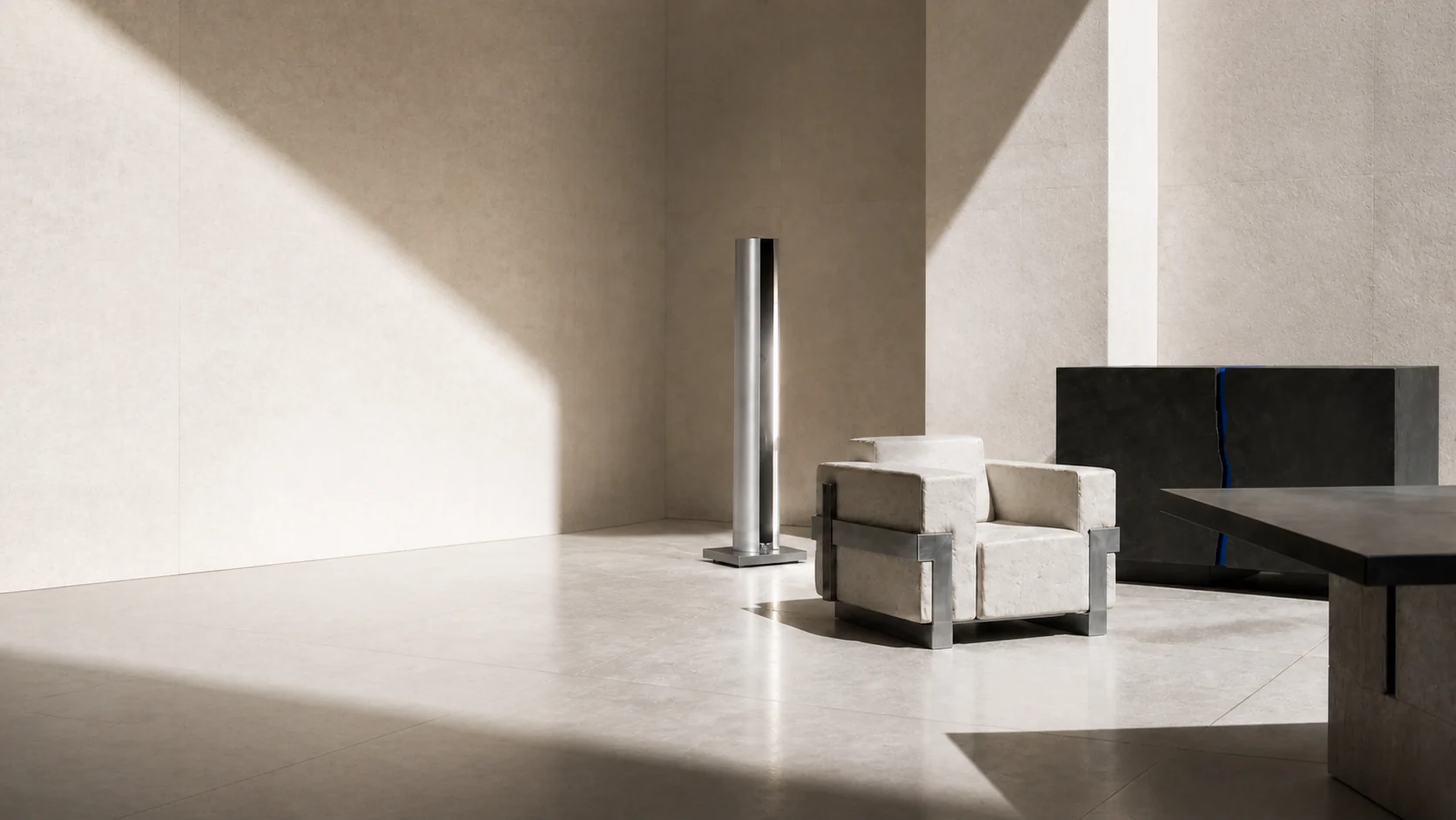 Mobilier sculptural ÉTRAVE mis en scène dans une architecture minérale sombre